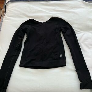 Free people movement black long sleeve with cut out back size M